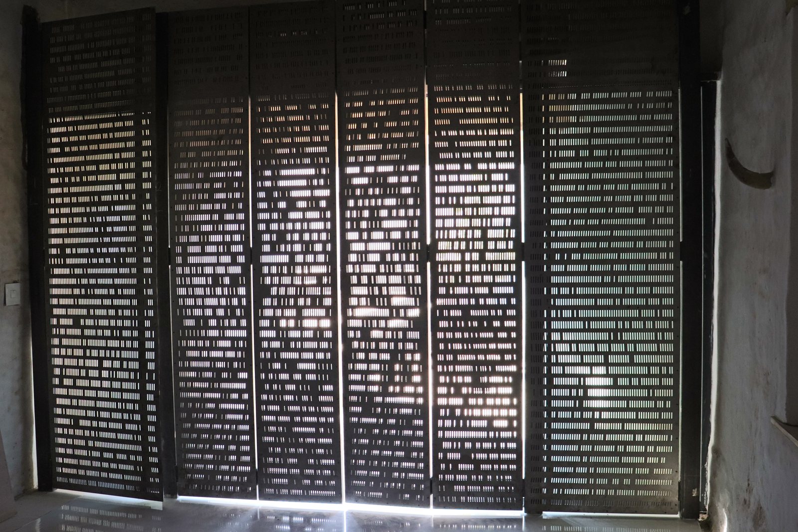 Buffelsdrift sheds — perforated screen, filtered light